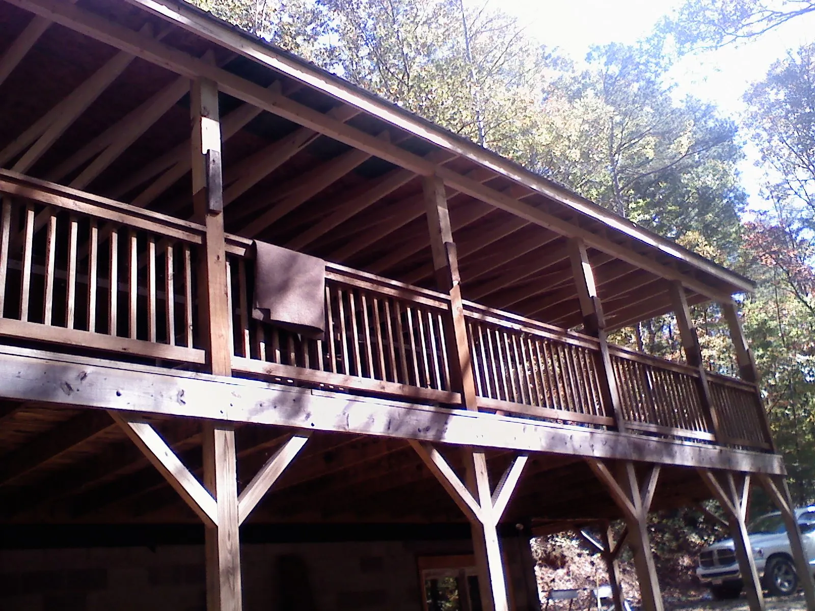 Timber framing under a new elevated porch and deck — Roof Leak Repair in Iuka by Roofing Brothers